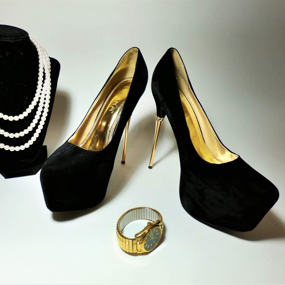 Black velvet pumps with gold heels